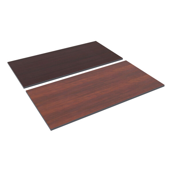 A rectangular wood table top with cherry and mahogany surfaces.