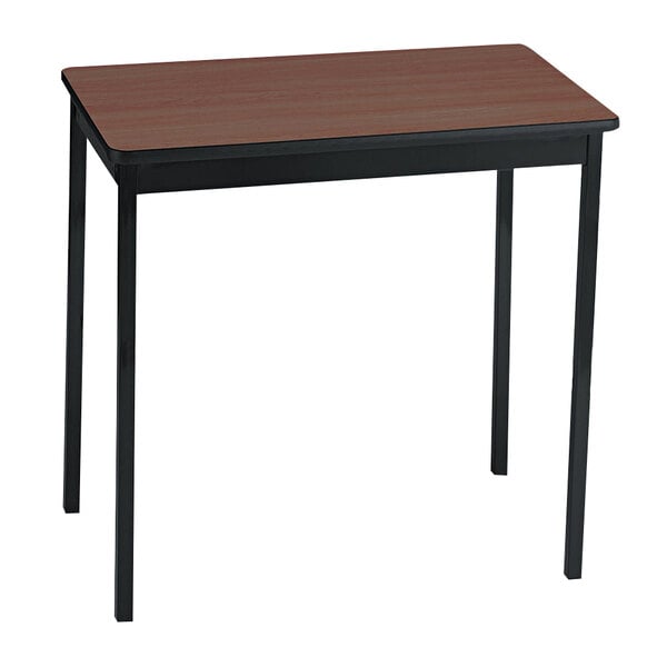 A brown rectangular Barricks utility table with black legs.