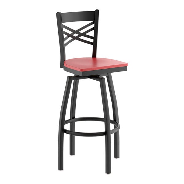 A black metal bar stool with a cross back design and a mahogany-colored wood seat.