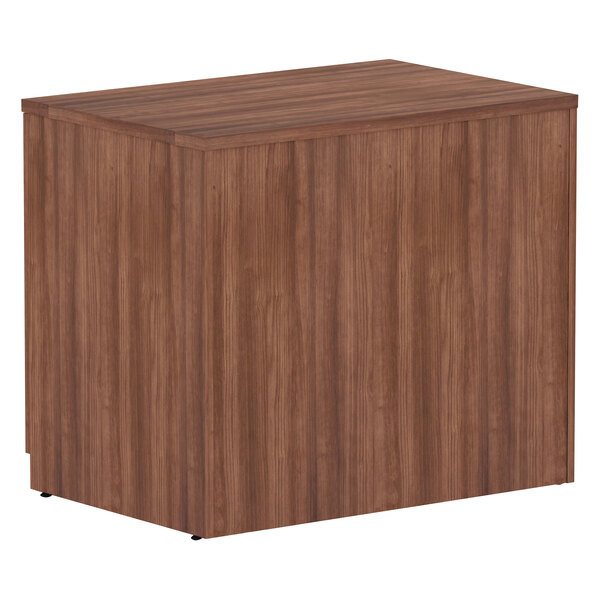 An Alera Valencia modern walnut office storage cabinet with a door.