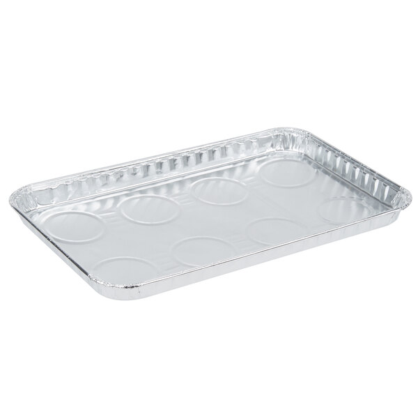 A Durable Packaging silver aluminum foil Danish pan with circles on the bottom.