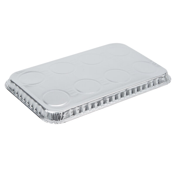 a close-up of a foil container