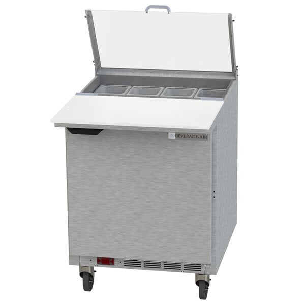 A Beverage-Air stainless steel commercial sandwich prep refrigerator with a clear lid open.