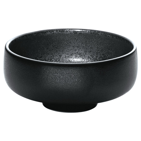 a black bowl with a white background