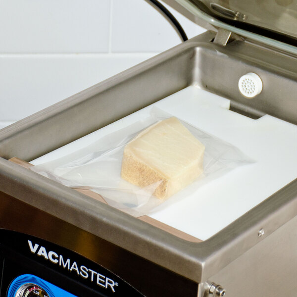 A piece of cheese vacuum packaged in an ARY VacMaster bag.