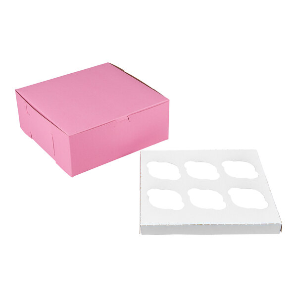 A pink cupcake or muffin box with a separate white insert featuring six slots for holding baked goods.