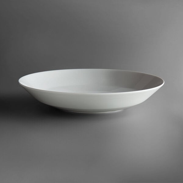 a white bowl on a gray background