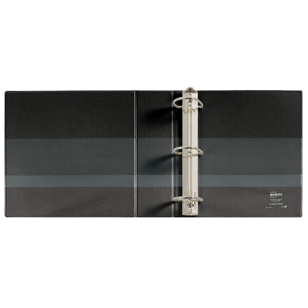 A black Avery DuraHinge binder with silver rings.