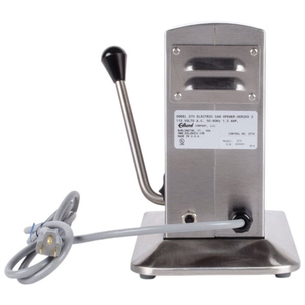 An Edlund Two-Speed Tabletop Heavy-Duty Electric Can Opener with a cable on a countertop.
