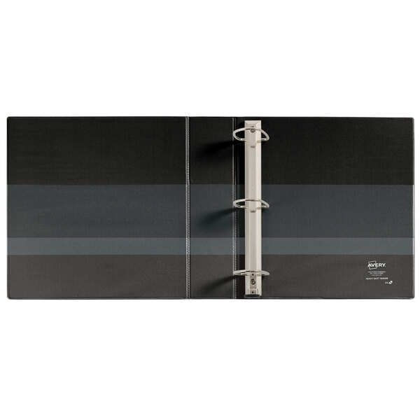 A black binder with silver ring binders.