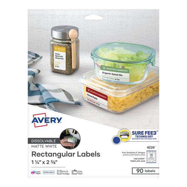 A package of Avery rectangle white dissolvable labels on a box of food containers.