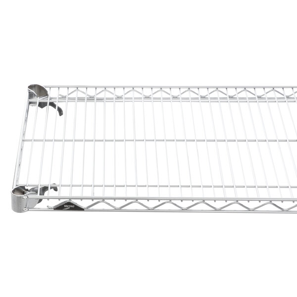 A close-up of a Metro Super Erecta chrome wire shelf.