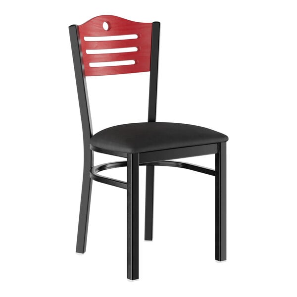 A standard height dining chair with a mahogany slatted backrest, black padded seat, and black metal frame.