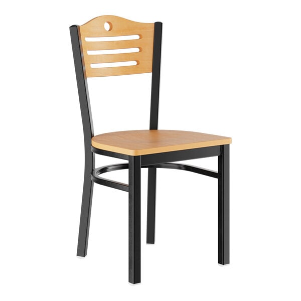 A standard height dining chair with a natural wood seat and backrest, supported by a black metal frame.