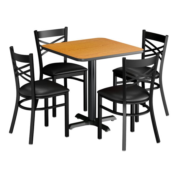 Lancaster Table & Seating 30" x 30" Reversible Walnut / Oak Standard Height Dining Set with Black Cross Back Chair and Padded Seat