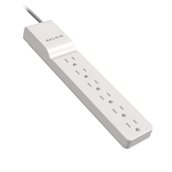 A close-up of a white Belkin power strip with a power cord.