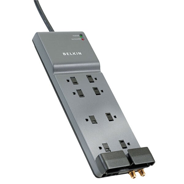 A Belkin dark gray surge protector with 8 outlets and 2 plugs.