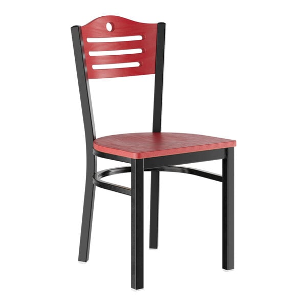A standard height dining chair with a mahogany wood seat and backrest, featuring a black metal frame.