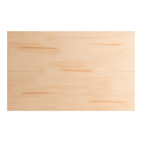 A close up of a Lancaster Table & Seating solid wood table top with a bleached oak finish.