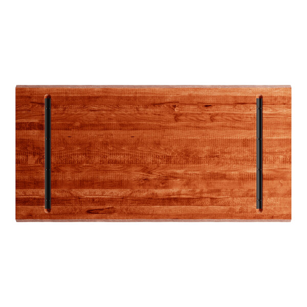 A rectangular Lancaster Table & Seating wooden table top with a live edge and rustic mahogany finish.