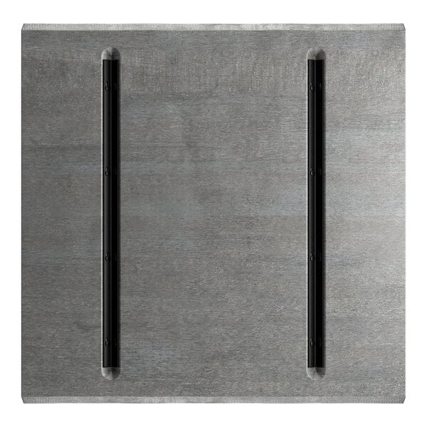 A square, slate gray wood surface with two parallel black metal strips running vertically along its length.