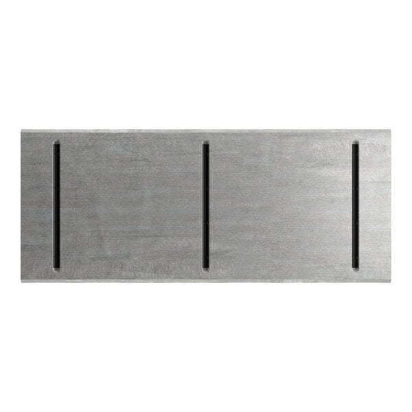 A rectangular, slate gray surface with a wood-like texture and three evenly spaced vertical grooves.
