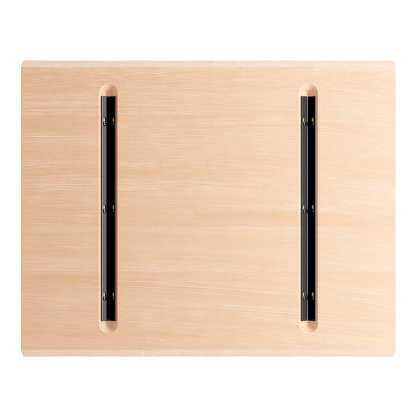 A Lancaster Table & Seating solid wood live edge table top with a bleached oak finish.