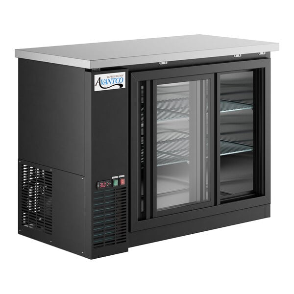 A black Avantco back bar refrigerator with glass doors and two shelves.