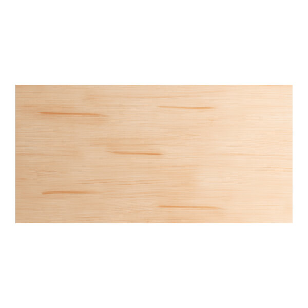 A close up of a Lancaster Table & Seating solid wood table top with a bleached oak finish.
