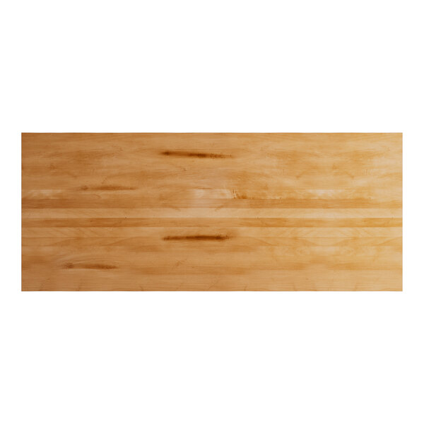 A Lancaster Table & Seating solid wood table top with a honey maple finish.