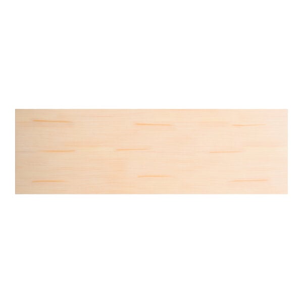 A rectangular solid wood live edge table top with a bleached oak finish.