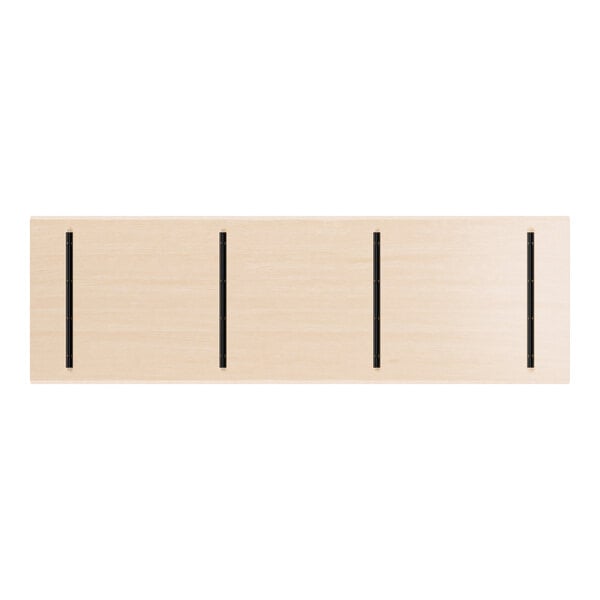 A rectangular wooden tabletop with a light bleached oak finish and four evenly spaced black vertical insets.