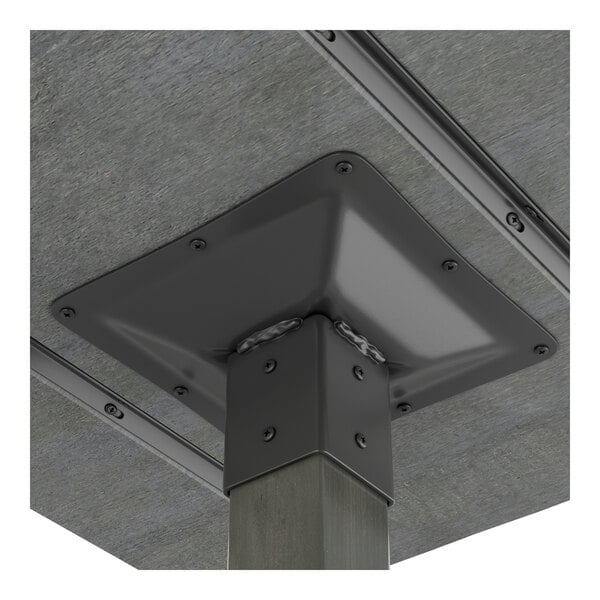 A square metal base with a metal plate on top for a Lancaster Table & Seating bar table.