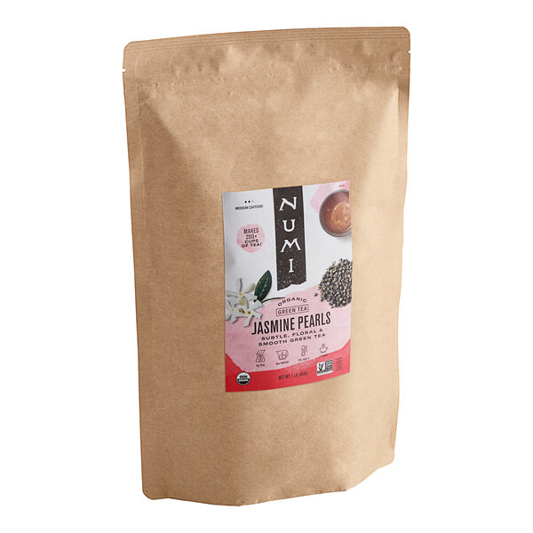 A brown Numi Organic package of Jasmine Pearls green loose leaf tea.