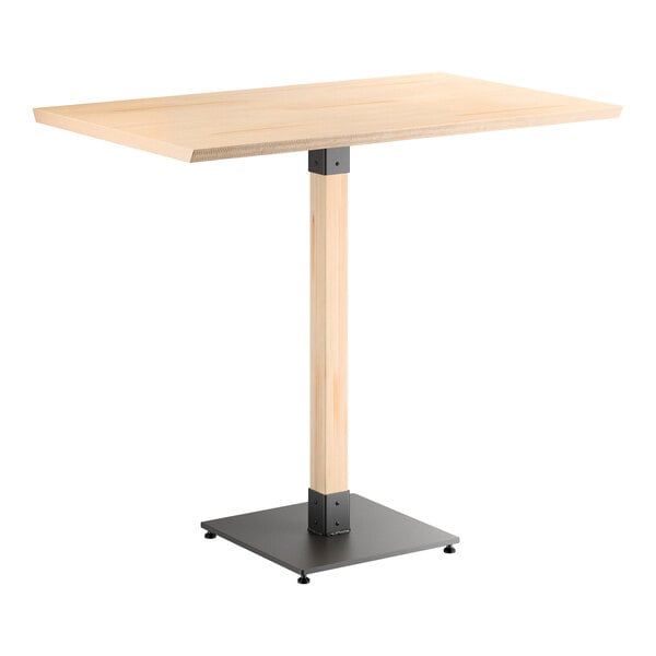 A rectangular bar-height table with a light wood top, a single central wooden support, and a black metal square base.