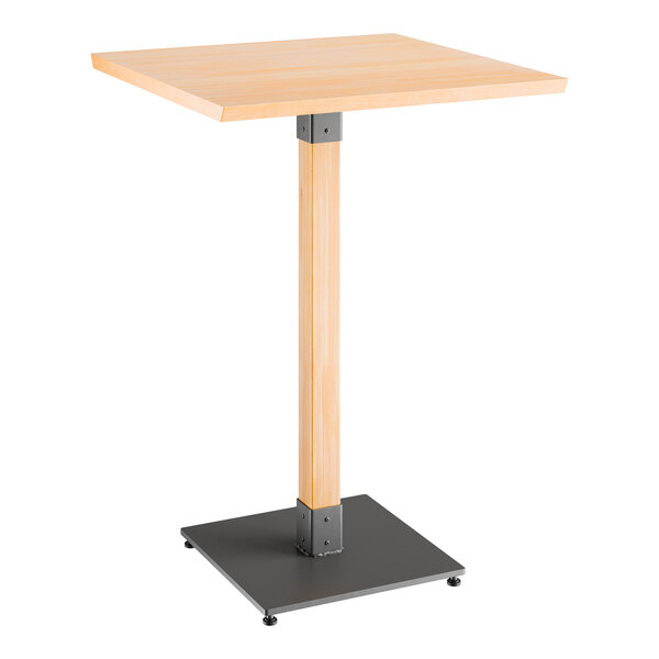 A Lancaster Table & Seating square wooden bar table with a metal base.