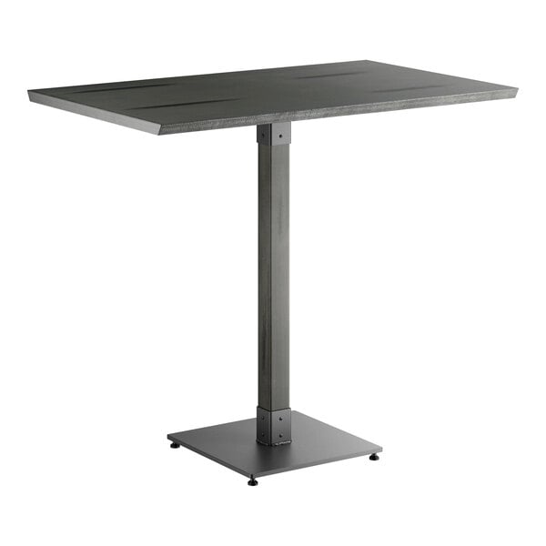 A rectangular bar-height table with a solid wood top and a single central metal pedestal base, finished in slate gray.