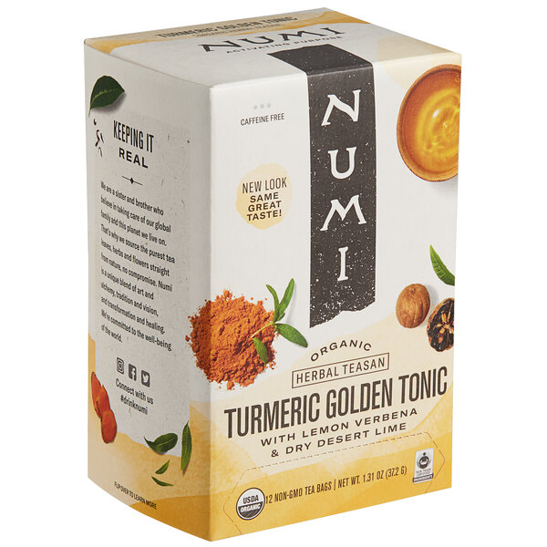 A white box of Numi Organic Golden Tonic Turmeric Tea Bags with yellow and white text.