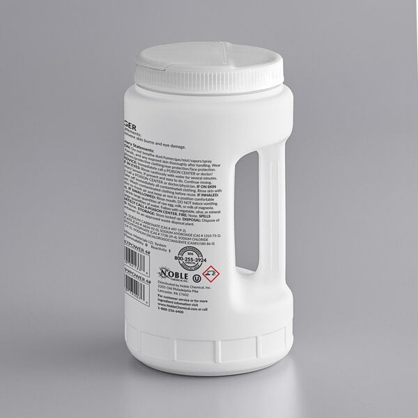 A white plastic container of Noble Chemical Power Machine Concentrated Detergent with a label.