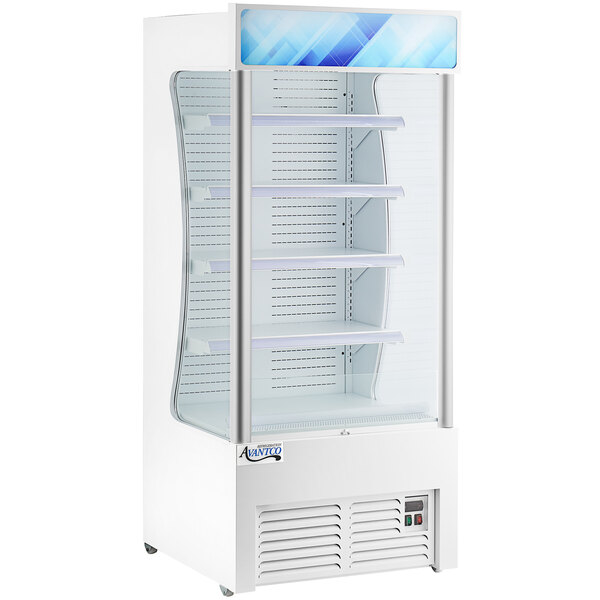 An Avantco white refrigerated air curtain merchandiser with shelves.