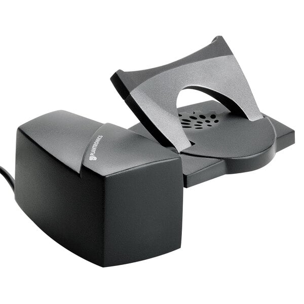 A black rectangular device with a cord attached to it.