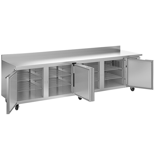 A stainless steel Beverage-Air worktop refrigerator with open doors.