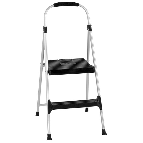A black and silver Cosco step stool with a handrail.