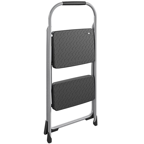 A black and gray Cosco 2 step folding step stool with a metal frame.