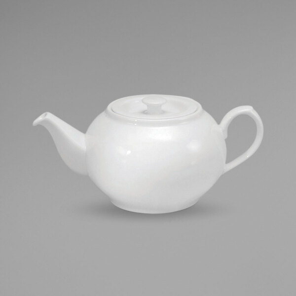 a white teapot with a spout