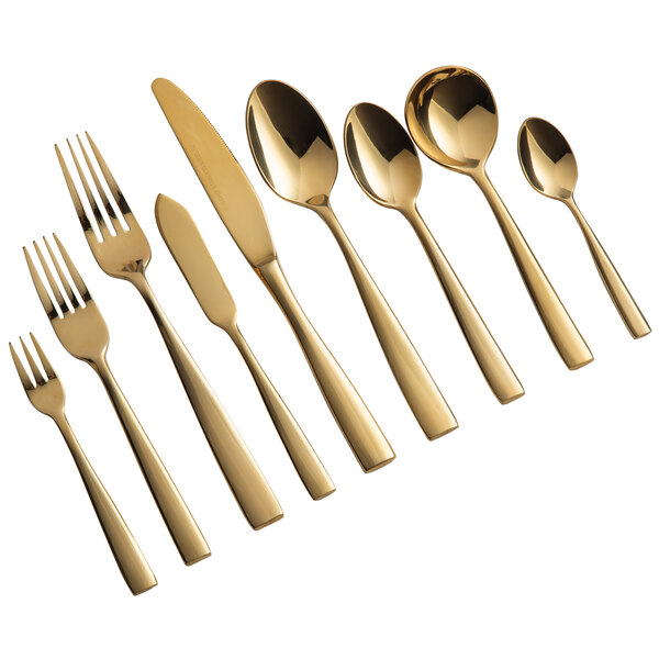 A close-up of a Bon Chef gold stainless steel dinner knife.