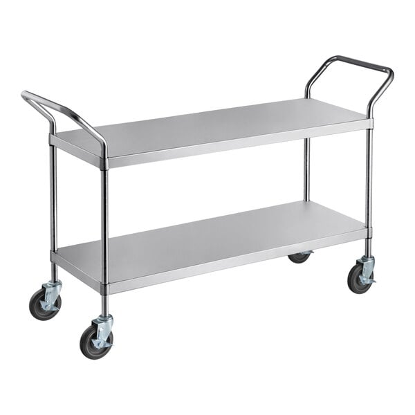 A stainless steel utility cart with two shelves and four caster wheels.