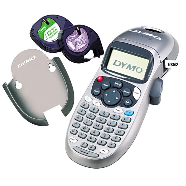 A close-up of a white DYMO LetraTag label printer with a pad and cord.