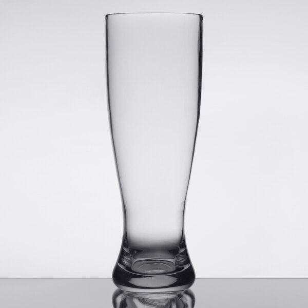 A Libbey Tritan plastic pilsner glass on a table.