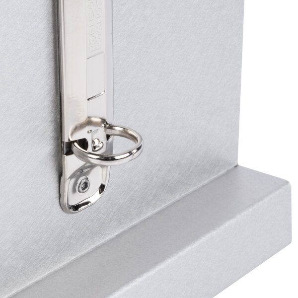 A brushed aluminum Menu Solutions table tent with a close-up of the metal finish.